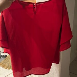 Red DIP top super comfortable and cute with bell bottom sleeves